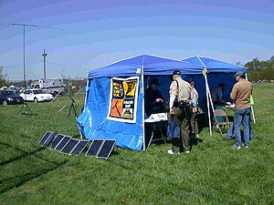 Solar-powered Amateur Radio Station in tents. Note the portable VHF/UHF satellite and HF antennas in the backgroundsource : https://en.wikipedia.org/wiki/Amateur_radio_emergency_communications